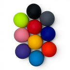 Assorted colorful massage balls on a white background