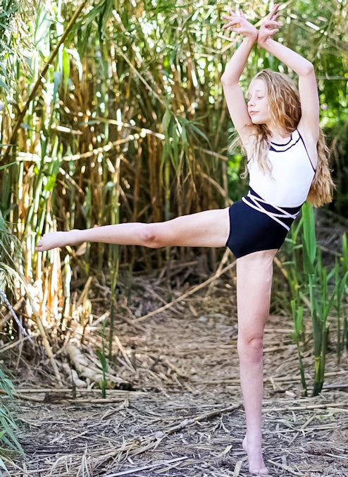 RSG-617 En Pointe Lycra Leotard. RS Gymwear Australia. Dancing leotard. Black & White Leotard. Dancer in long grasses.